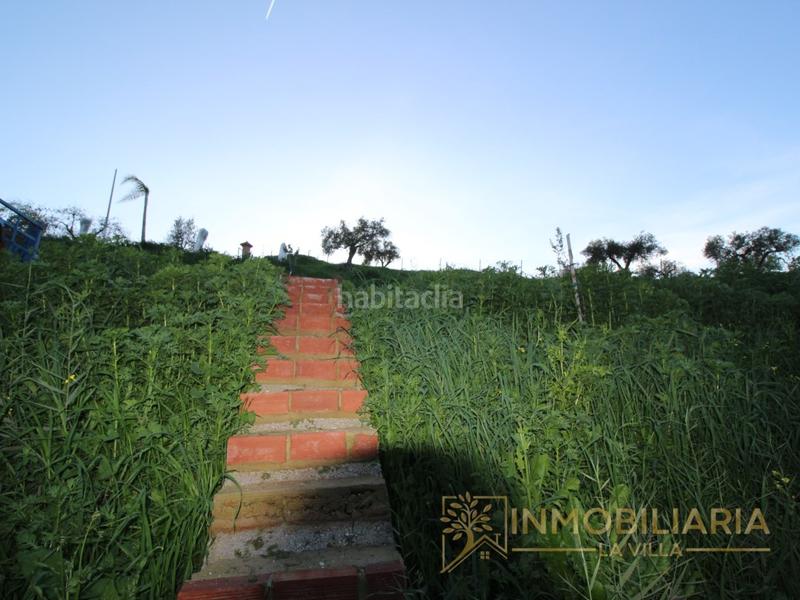 Foto ffdd2949-206b-4f76-86d4-2c0d60817c91. Terreno residencial excepcional terreno rustico con agua ,luz y vallado. en Alhaurín de la Torre