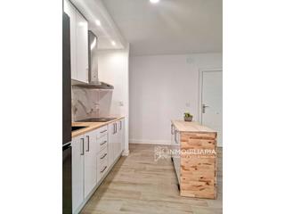 Appartement  N/a. Piso en venta totalmente reformado  planta baja con patio privad