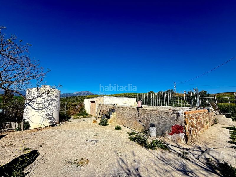 Foto 38a883b5-6fc1-4350-9901-49bc24a266b3. Masia amb aparcament a Coín