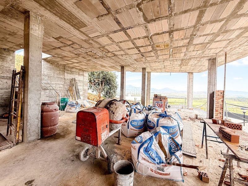 Foto b3fb7b6a-bca4-425a-b7f6-105e59bb2752. Casa amb aparcament piscina a Coín