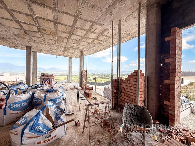 Foto c973c352-57d3-4351-b449-58155e3ef7eb. Casa amb aparcament piscina a Coín