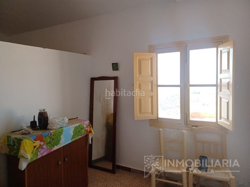 Foto 11a8ad49-c13f-4a6c-b393-940a9111a00c. Casa amb aparcament a Alozaina