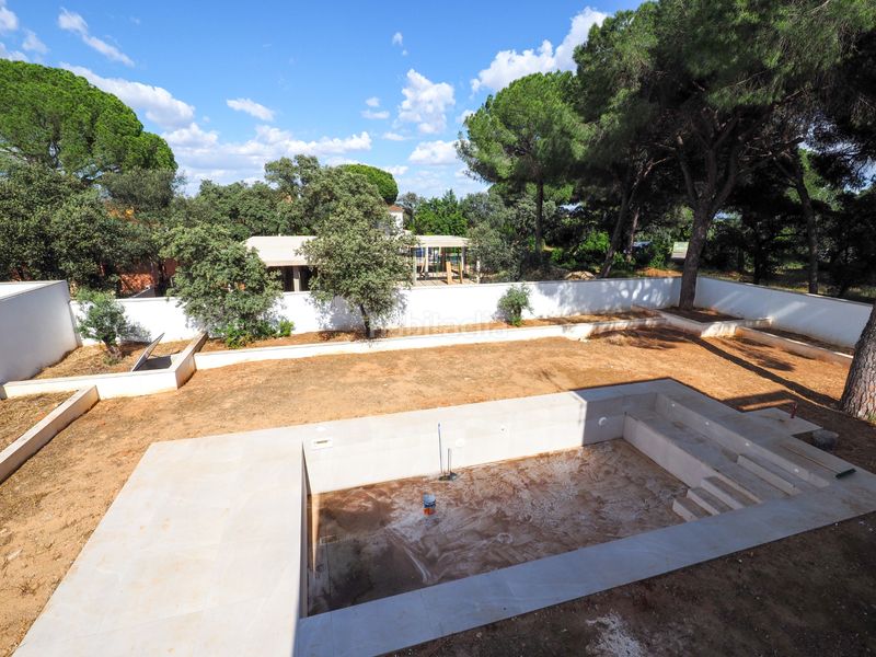 Foto b005d6c8-3640-45ea-8711-dccac7b5487f. Xalet amb piscina a Bollullos de la Mitación