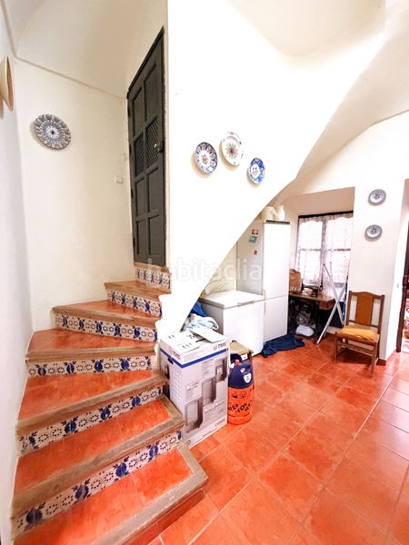 Foto 8d5e0591-4b0c-4926-a257-84916d939b89. Casa adossada amb xemeneia a Zafra