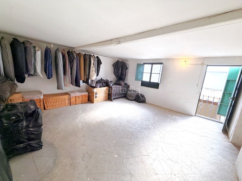Foto a410a211-a718-463e-935c-49c9071f9158. Casa adossada amb xemeneia a Zafra
