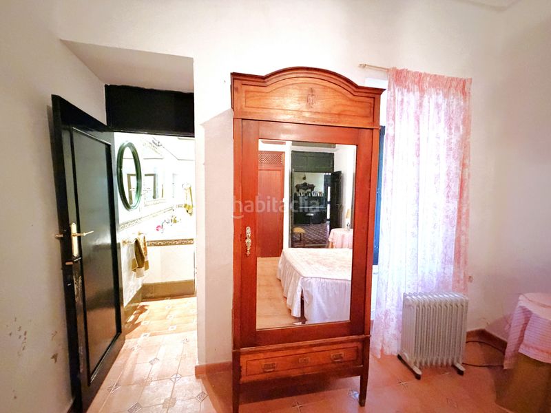 Foto b5d4c3ba-1e1f-40e8-a59e-4f1991b89268. Casa adossada amb xemeneia a Zafra
