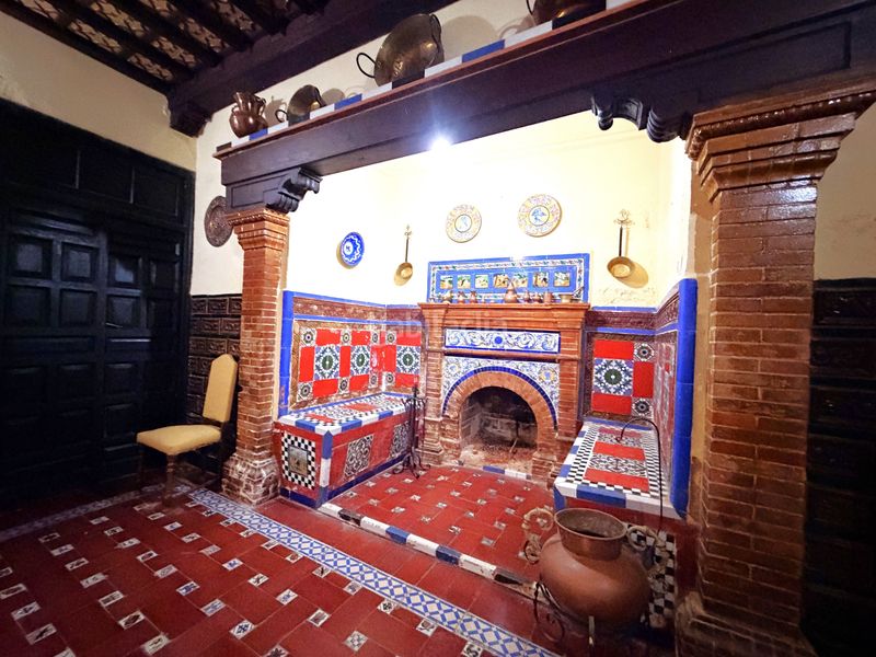 Foto c5447f4b-ae62-4f89-bedd-f16d238ff821. Casa adossada amb xemeneia a Zafra