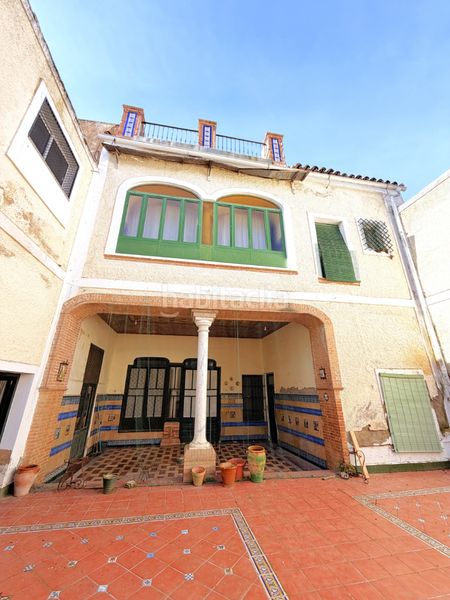 Foto f9452b2f-bca0-4db4-88d7-ceeb4791724f. Casa adossada amb xemeneia a Zafra