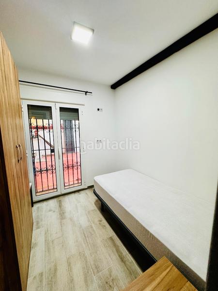 Foto 2775b1cc-f2df-4a72-a0ee-e54e947d6138. Location appartement avec cheminée chauffage dans Triana Este Sevilla