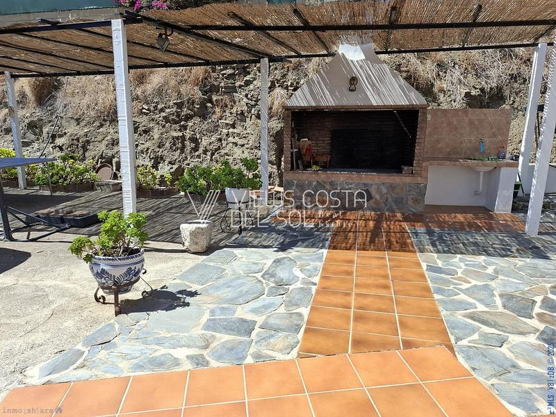 Foto 12bd9c13-64f7-4db0-ae90-031c75fe73ab. Casa  de campo con parcela de 1238 m2, piscina privada, zona de barbacoa y terraza en Frigiliana