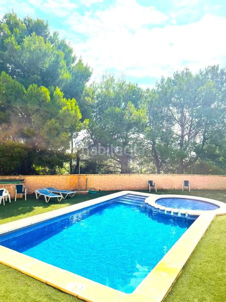 Foto 343c9f0b-81c6-40d4-8d7c-a92f2ede32da. Casa adossada amb aparcament piscina a El Tossal-Bello Horizonte Nucia (la)