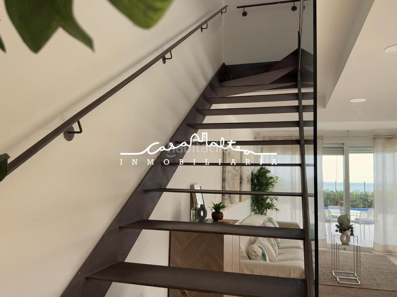 Foto 0868a6dd-d960-412d-ad26-26c29703de2f. Chalet casa frente al mar en El Marenyet Cullera