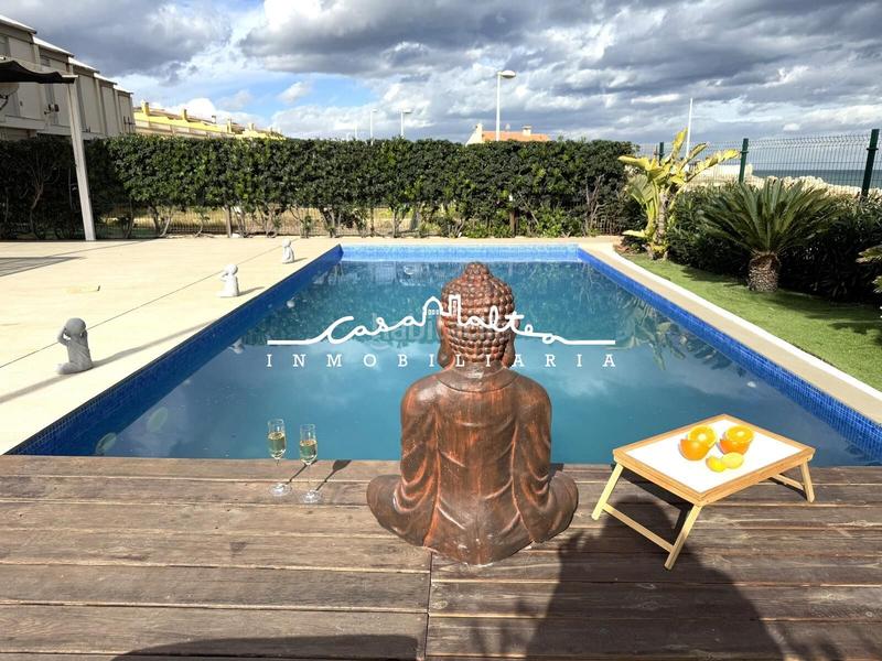 Foto 5016945a-0aa0-4c8a-bbaf-7ff6d0ee3294. Chalet casa frente al mar en El Marenyet Cullera