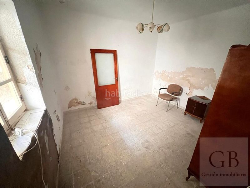 Foto 5d09ce37-e7a6-455f-abb2-5bf269cf6090. Chalet casa en venta en Consuegra