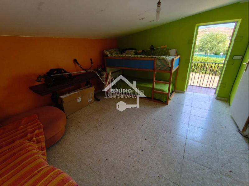 Foto 0a2ebb0d-f8b6-448f-9d0f-7095f303f328. Finca rústica terreno con casa de campo en Lodosa