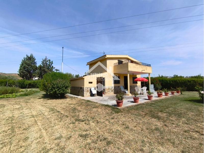 Foto fc4127ff-b824-4078-92a6-bfb1cb82dd05. Finca rústica terreno con casa de campo en Lodosa