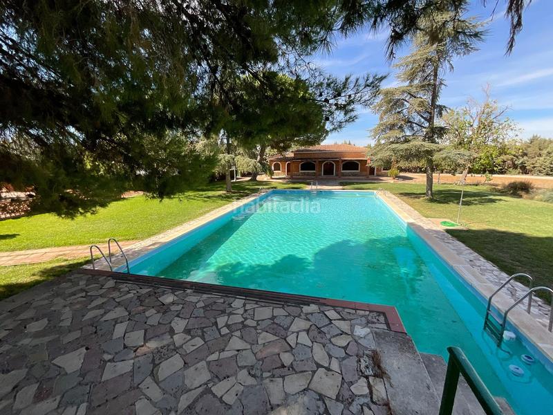 Foto 1d0613f7-97df-43b5-8a2e-45a3d80247ae. Masía complejo con 4 viviendas independientes y piscina en Antequera