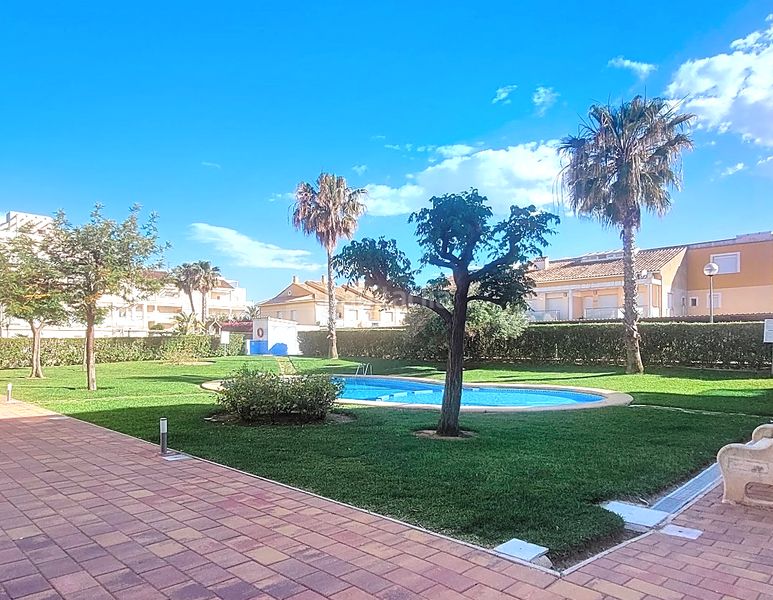 Foto 8ef8348d-1d90-407f-b0c6-a3bd70e878ab. Casa adossada amb piscina a Oliva playa Oliva