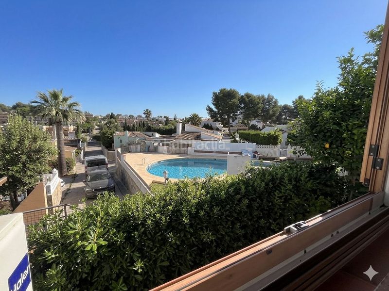 Foto bb9903cc-b9c0-41f9-b3d0-8e88391b96f9. Casa adossada amb calefacció piscina a Las Rotas / Les Rotes Dénia