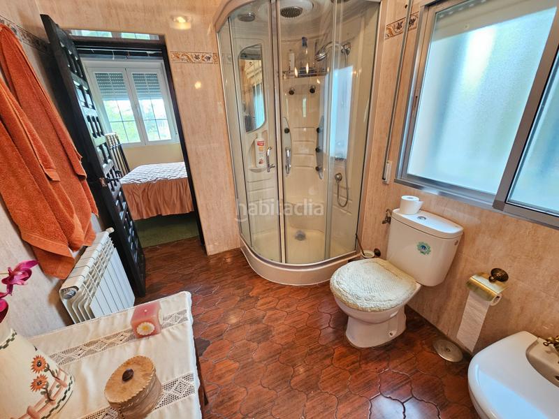 Foto 16a8d3e1-96d9-401c-91a7-c80432f1c851. Xalet amb xemeneia calefacció aparcament piscina a Cabanillas de la Sierra