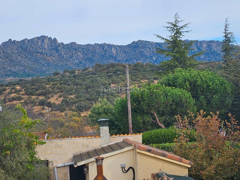 Foto 2561ecc1-c658-4e2d-b541-7e0beca598c1. Xalet amb xemeneia calefacció aparcament piscina a Cabanillas de la Sierra