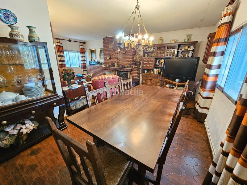 Foto 7263d0ff-bcec-4fd3-8176-ca33c53ab137. Xalet amb xemeneia calefacció aparcament piscina a Cabanillas de la Sierra