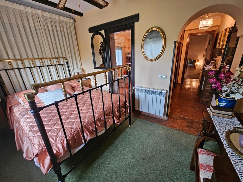 Foto 7c56db3e-6112-4e78-af08-652060e7cad9. Xalet amb xemeneia calefacció aparcament piscina a Cabanillas de la Sierra