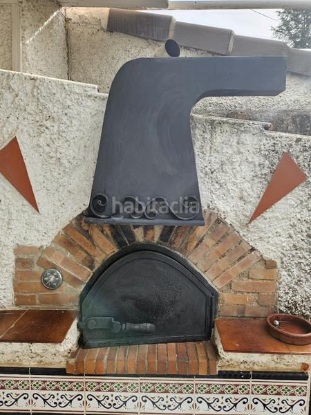 Foto 8a0b2182-1c24-4f75-bce6-67b9572a939a. Xalet amb xemeneia calefacció aparcament piscina a Cabanillas de la Sierra