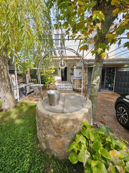 Foto 97d12c0c-a3a6-4a93-a6a0-e40ad12467a5. Xalet amb xemeneia calefacció aparcament piscina a Cabanillas de la Sierra