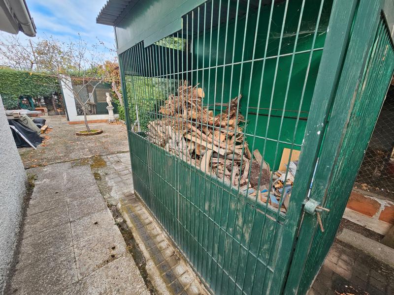 Foto f2fe5512-6feb-45e9-ba0a-a005df5bba13. Xalet amb xemeneia calefacció aparcament piscina a Cabanillas de la Sierra