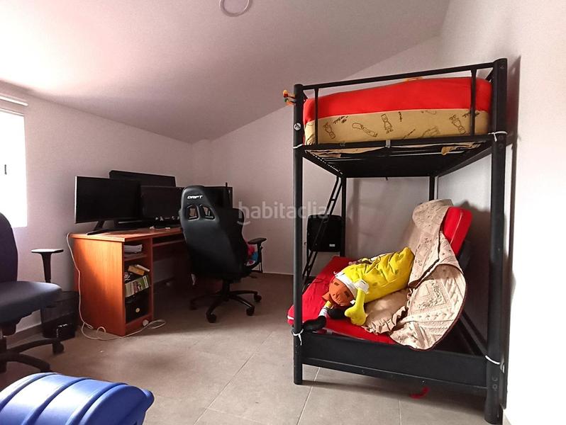 Foto 59d2410c-a557-4aff-81f5-270b793a3452. Casa adossada a Cheste