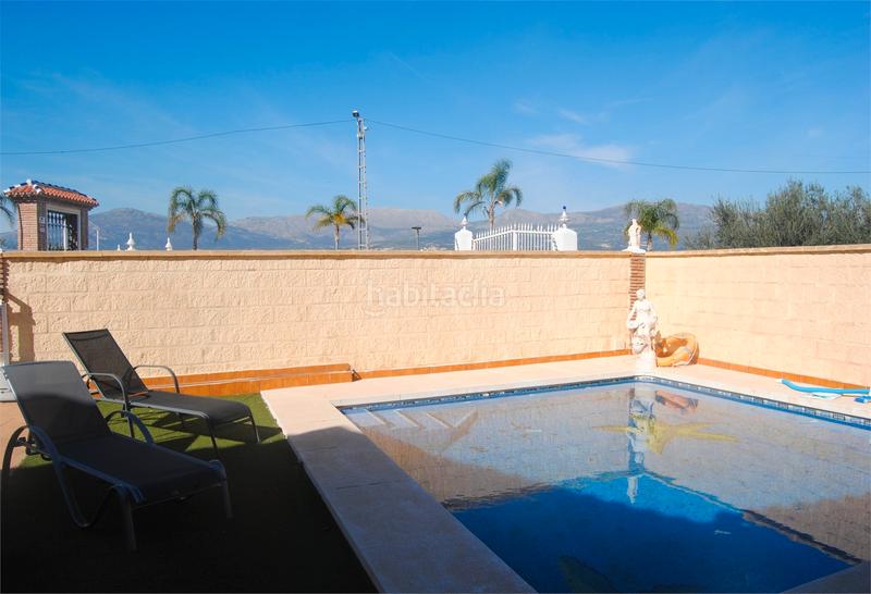 Foto 8cc76dbb-8f75-406b-a42d-1b6f24d28fe9. Casa amb xemeneia aparcament piscina a Viñuela