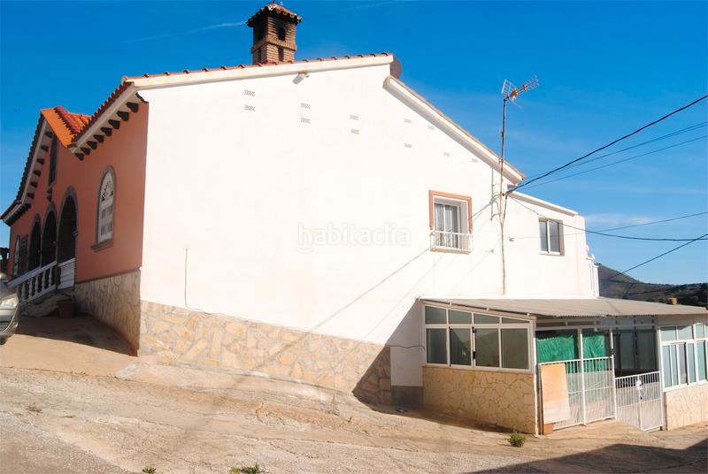 Foto a2385351-8a74-44b5-99f4-d156cc2cb93c. Casa amb xemeneia aparcament piscina a Viñuela