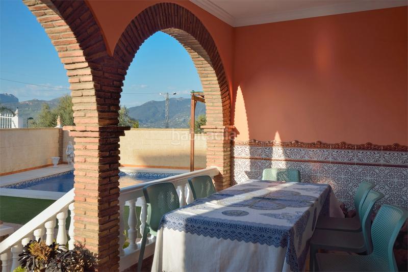 Foto bce347fe-e77d-4a81-a177-853bf51ed520. Casa amb xemeneia aparcament piscina a Viñuela