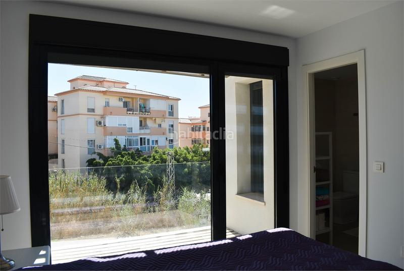 Foto 76eba2c1-1c0a-4d52-8015-e95b3a5d84e8. Casa a schiera con parcheggio piscina in Benajarafe