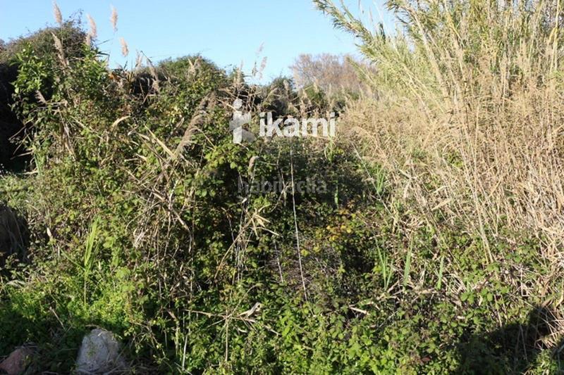 Foto e2395304-3d63-4fd8-b426-f0018707b984. Rural plot in Pego