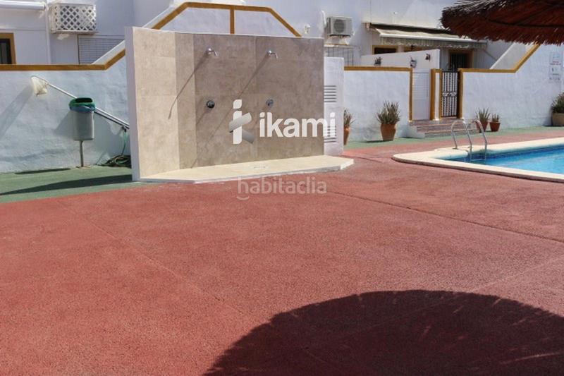 Foto b9c6da8f-2d59-47e6-95cc-edbc129dc1ce. Maison jumelée avec chauffage piscine dans Verger (el)