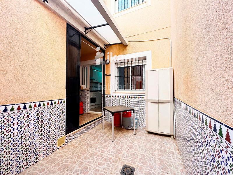 Foto b1bda648-eee4-4555-a1b0-fa54f7c7bffa. Casa adossada amb calefacció aparcament a Santiago de La Ribera San Javier