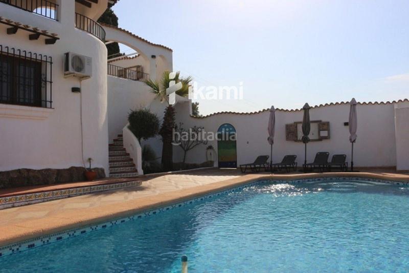 Foto a939ee6f-054d-49a0-b0a5-dc319cad4c91. Casa amb calefacció aparcament piscina a Pego