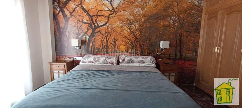 Foto 0023fd61-6721-48cc-8211-63bf0fff97ca. Casa adossada amb xemeneia calefacció a Andújar