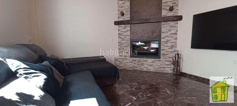 Foto 5962cb59-db79-4862-9921-e1568609cb24. Casa adossada amb xemeneia calefacció a Andújar