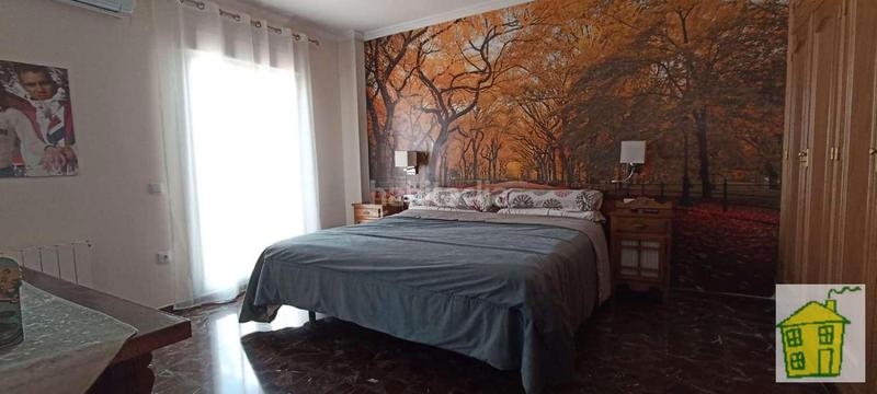 Foto 63586f6a-bcab-42e4-b5ef-278ad07058f0. Casa adossada amb xemeneia calefacció a Andújar