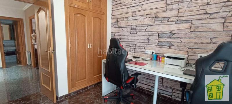 Foto dcf1f8af-0b2c-4239-bf60-ebcb2ecba868. Casa adossada amb xemeneia calefacció a Andújar