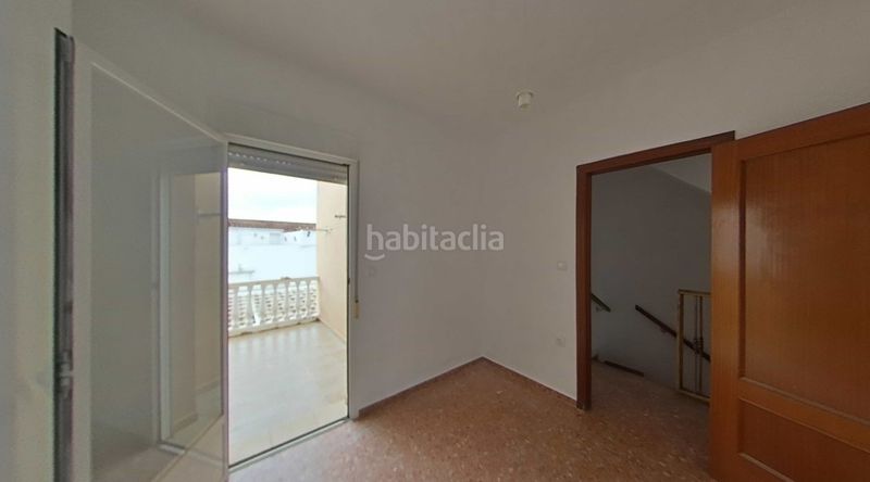 Foto 7681b214-0f3f-4a78-8f05-02d955467a49. Casa adossada amb aparcament a Andújar