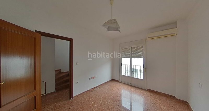 Foto e7ff0876-4943-48fe-8030-304afe1a2528. Casa adossada amb aparcament a Andújar