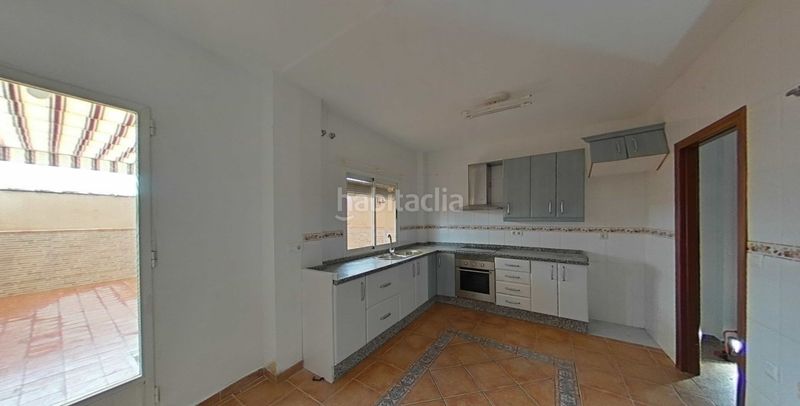 Foto fa447a88-e2bf-4f9b-bd38-42cf0cd9c8aa. Casa adossada amb aparcament a Andújar