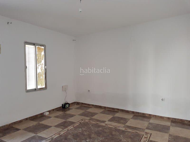 Foto 7aa2925d-9e0c-4b5d-b359-8378459bb936. Casa adossada a Carolina (La)