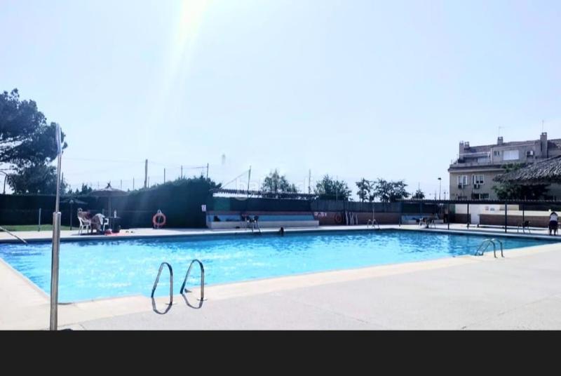 Foto e5ef1f12-291f-4fcf-ac80-8c13d8daec9e. Casa adossada amb calefacció piscina a Perales del Río Getafe