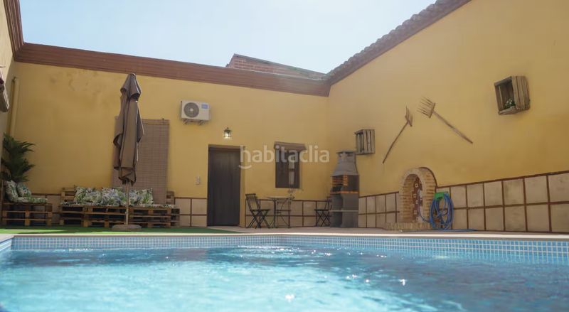 Foto 7b461c0a-6f9a-4038-8ef9-c85d545f5fb1. Casa amb calefacció aparcament piscina a Villamiel de Toledo