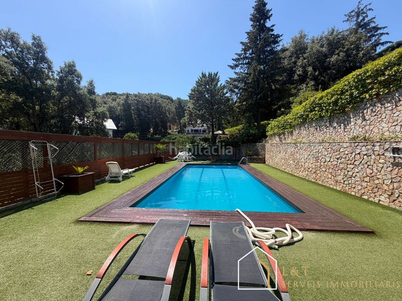 Foto bc9c9d49-3451-4785-8760-3472de27412c. Xalet amb xemeneia calefacció aparcament piscina a Vallgorguina